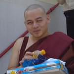 The new monk bring his first offerings